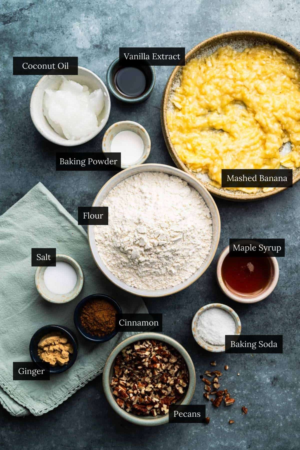 Ingredients for healthy banana scones with each ingredient labeled.