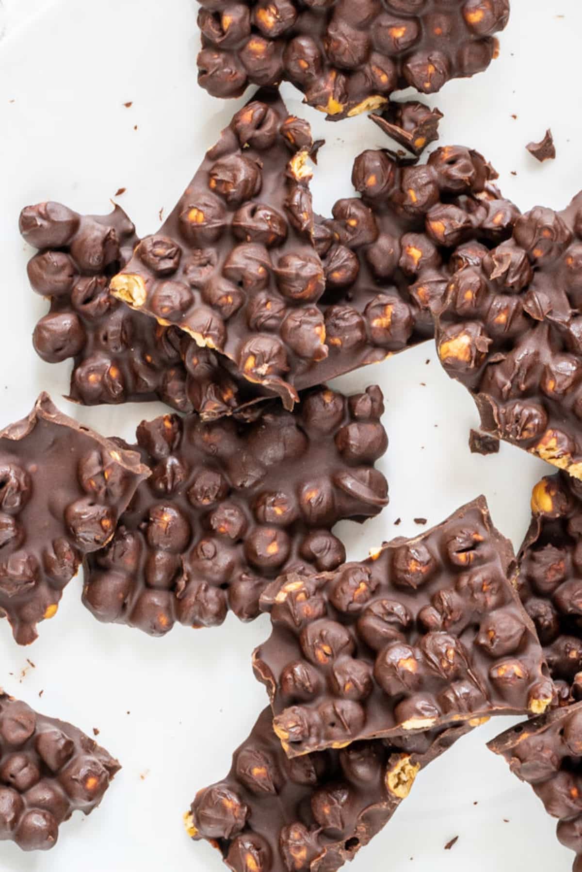 Large chunks of chocolate covered chickpeas.