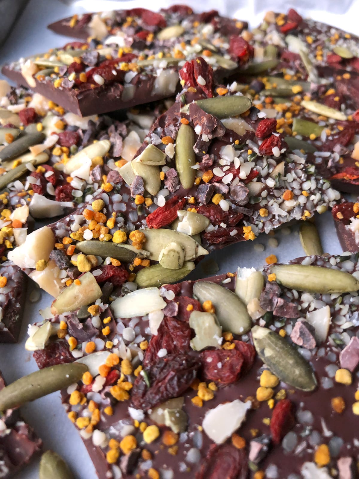 Tray of superfood dark chocolate bark pieces.