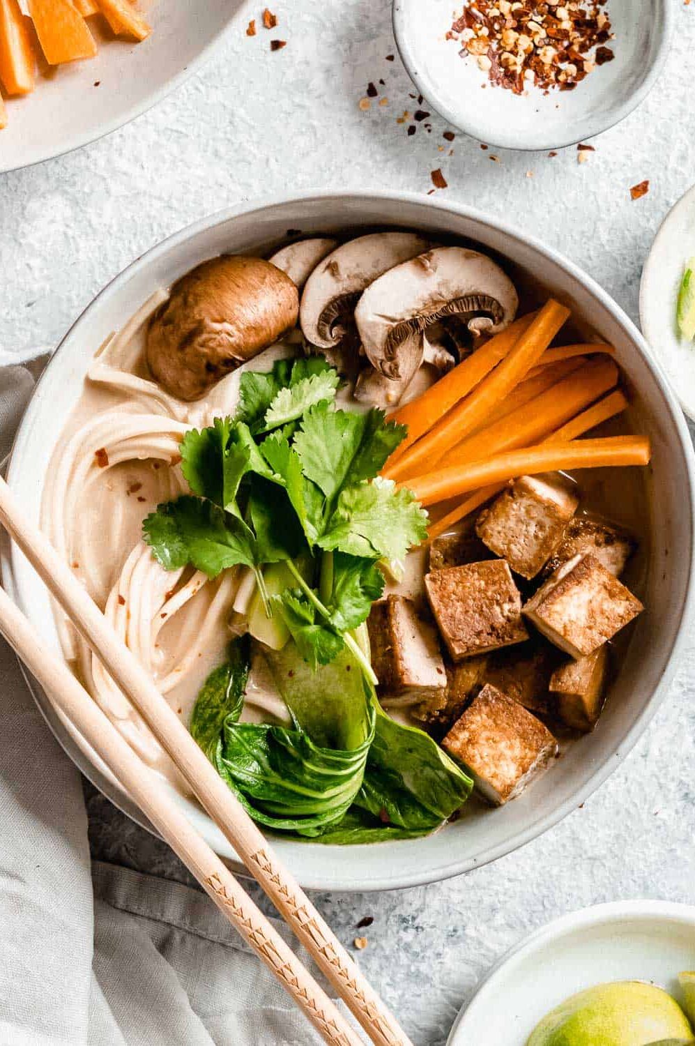 Large bowl filled with vegan ramen and veggies.