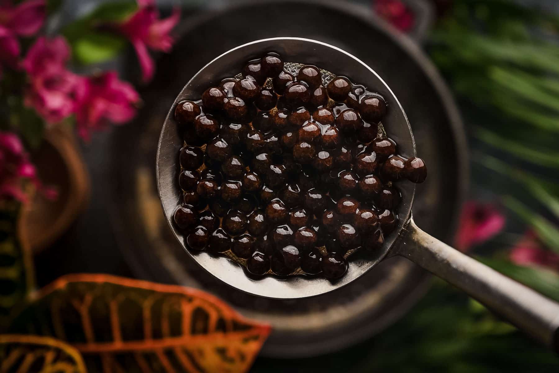 Cooking the tapioca pearls in a cast iron pot for homemade oolong boba tea.