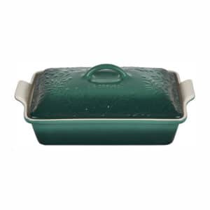 A green casserole dish with a handle.