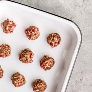 Enamel tray of pomegranate oat balls.