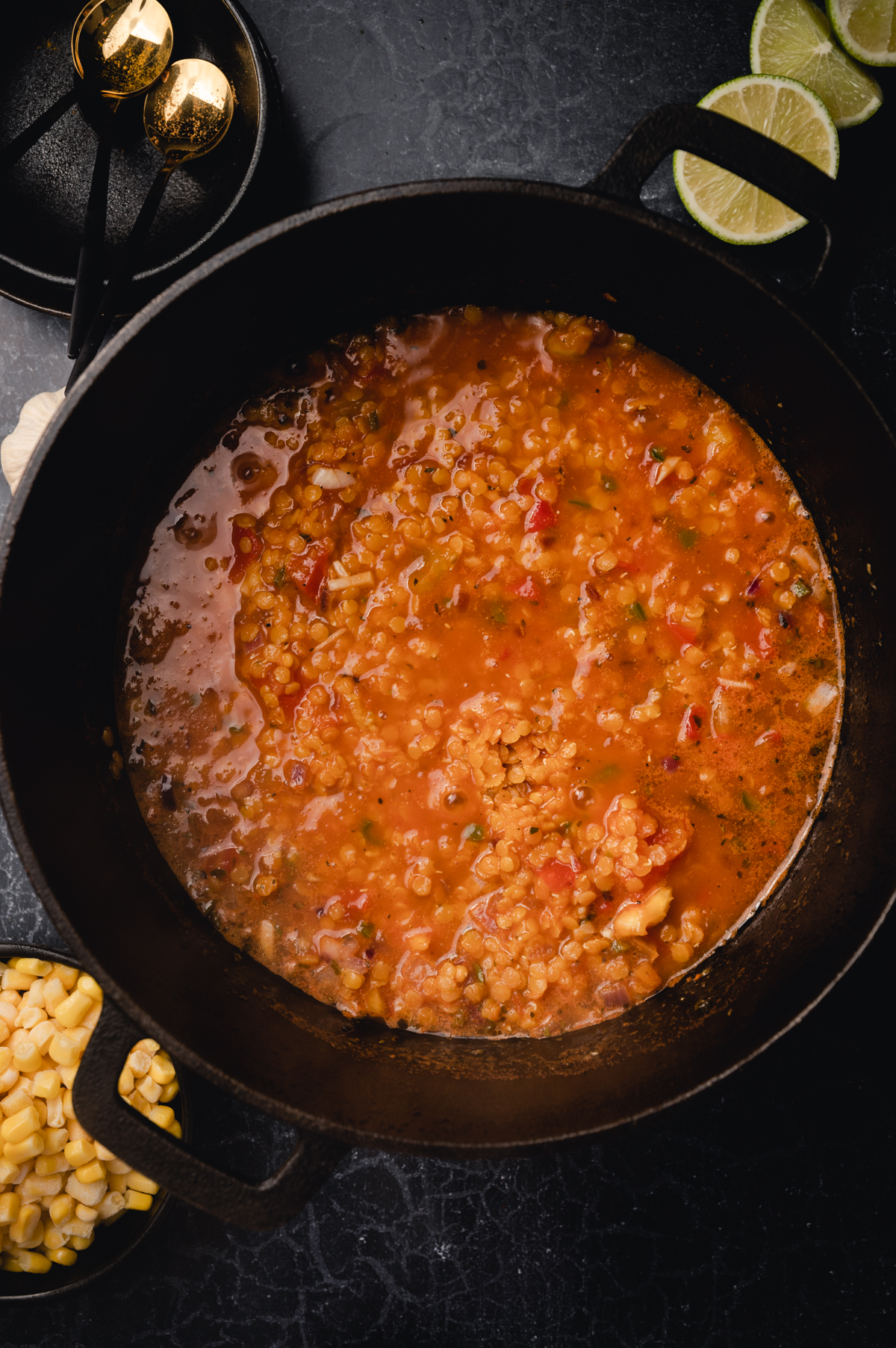 Plant based chili recipe in a black Dutch oven.
