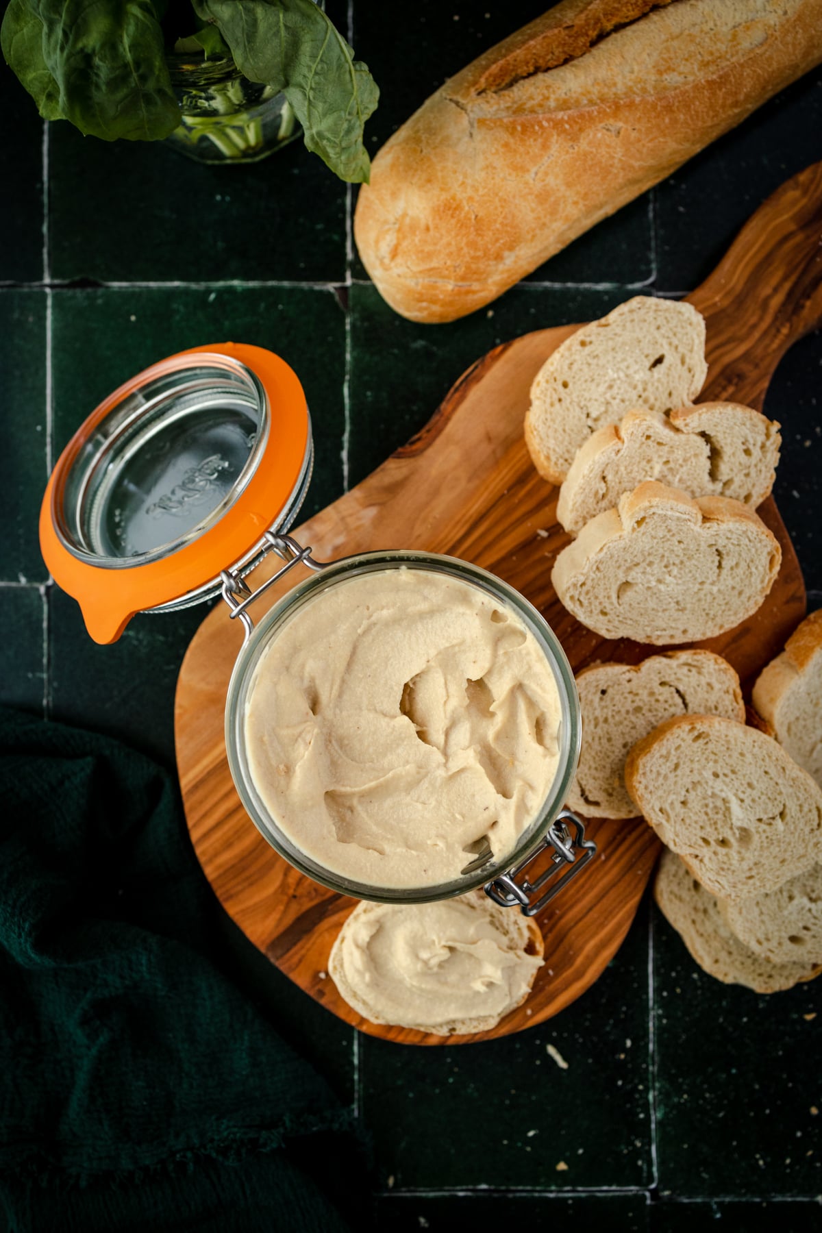 Creamy ricotta cheese in a glass Le Parfait jar.
