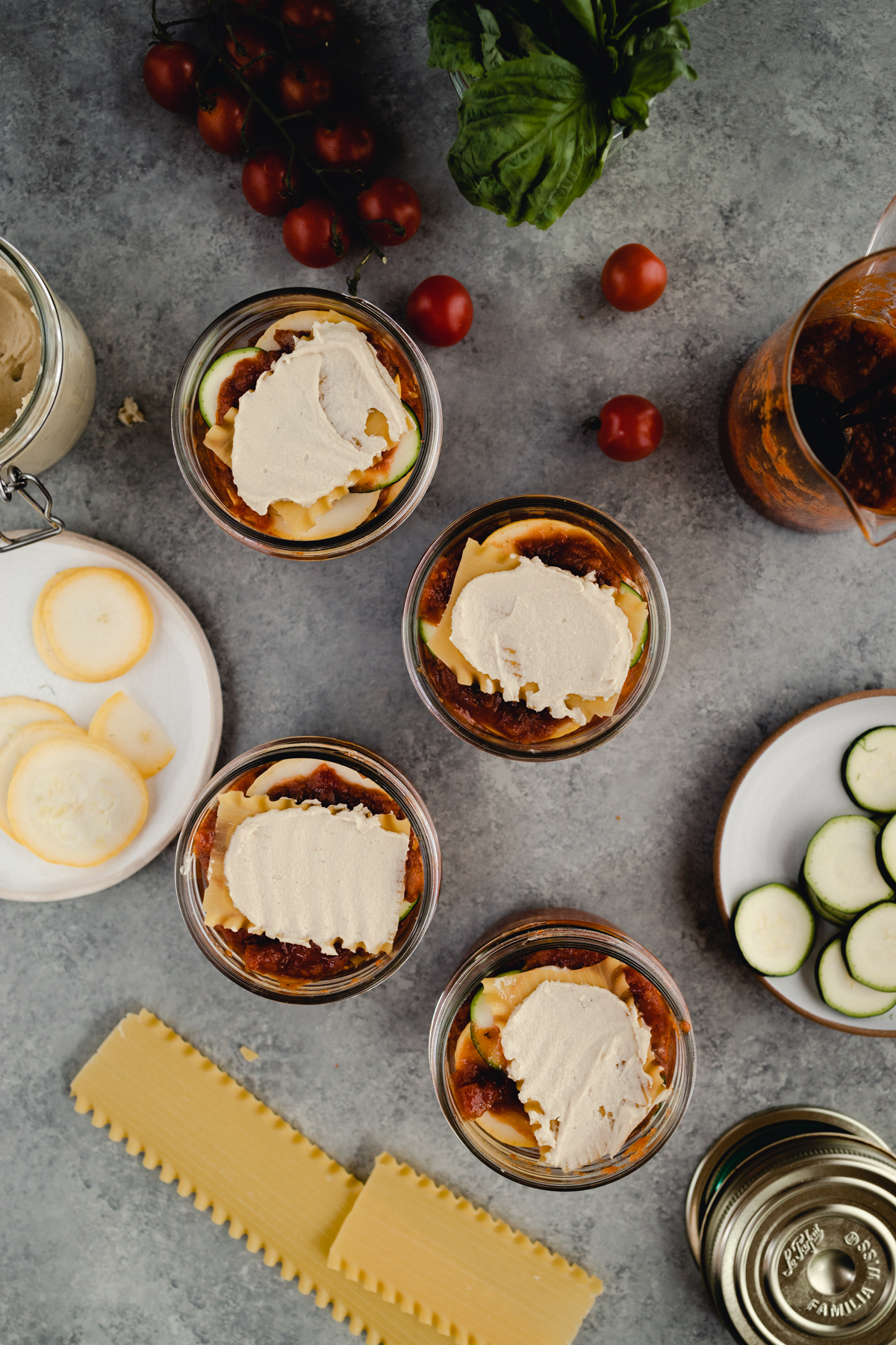 Step-by-step-photo of homemade mini lasagna made in a jar.