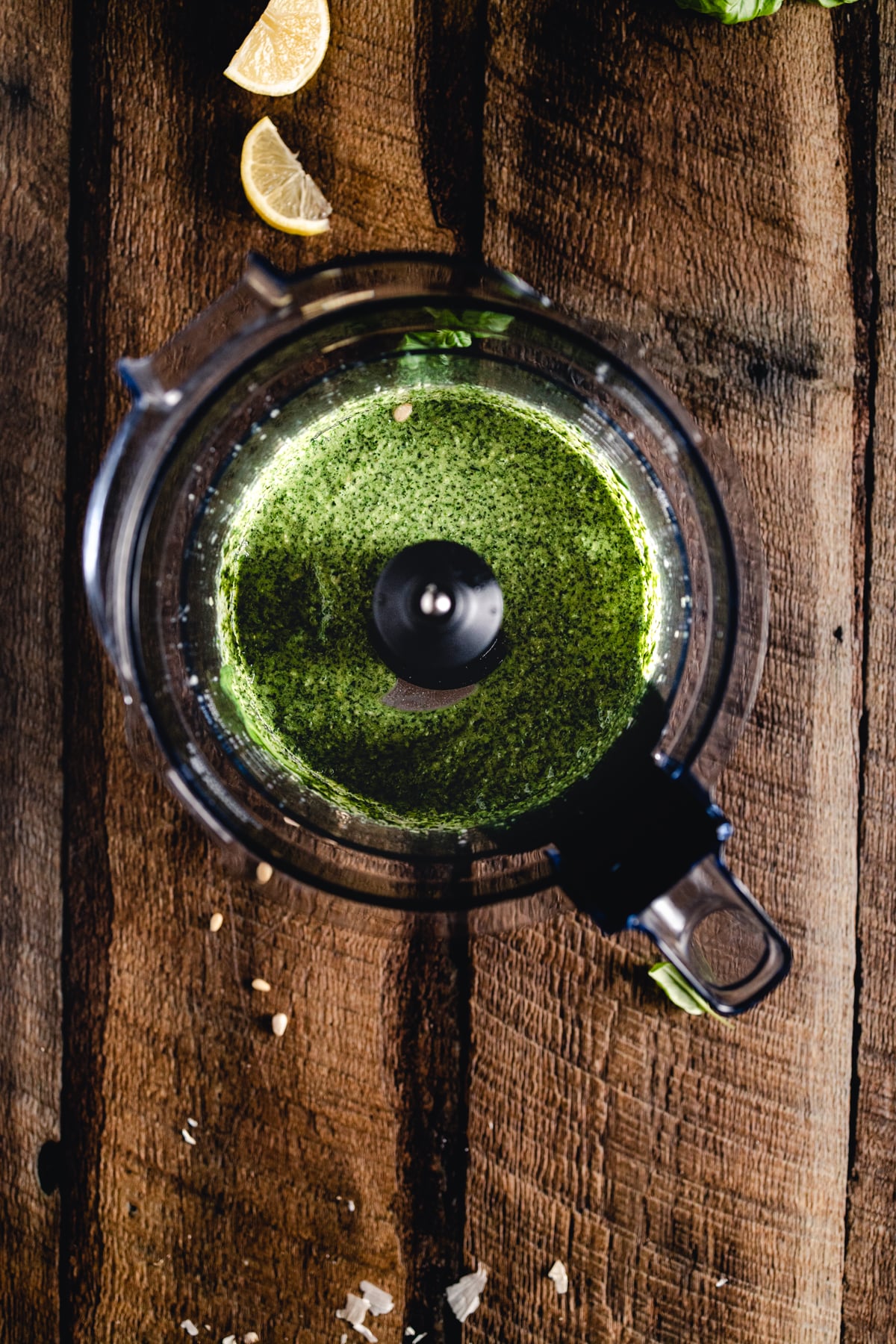A blender filled with green juice.