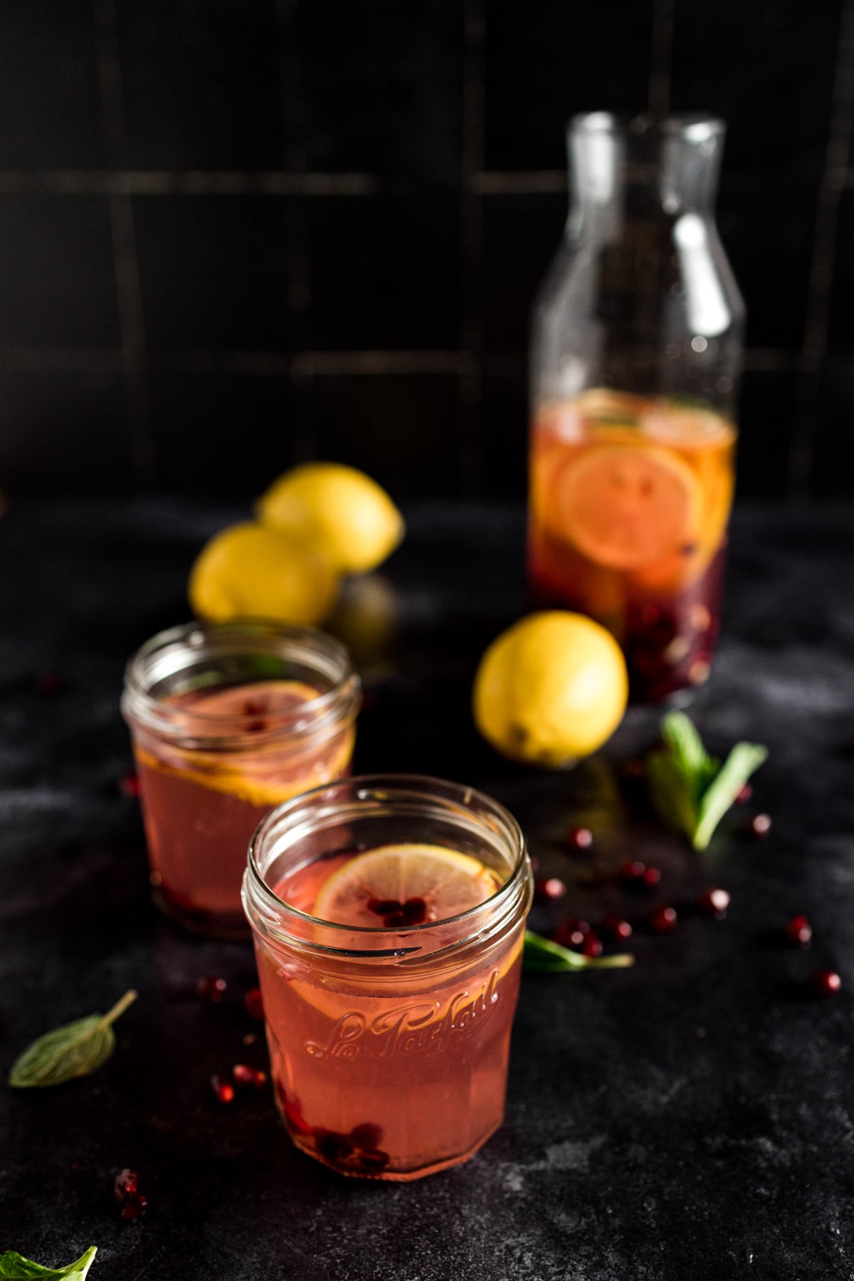 Pomegranate lemonade with pomegranate seeds.