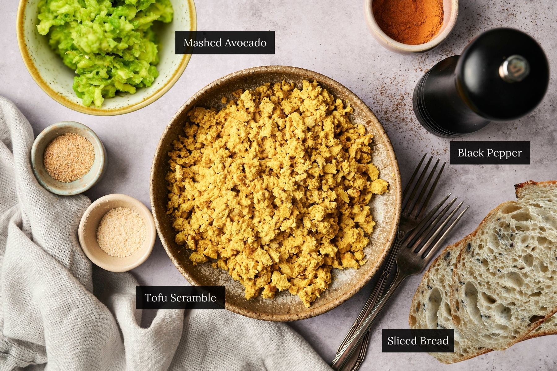 Ingredients for avocado protein toast labeled.