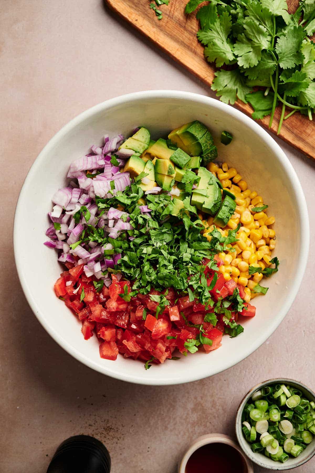 Ingredients for homemade Texas caviar in a white bowl.