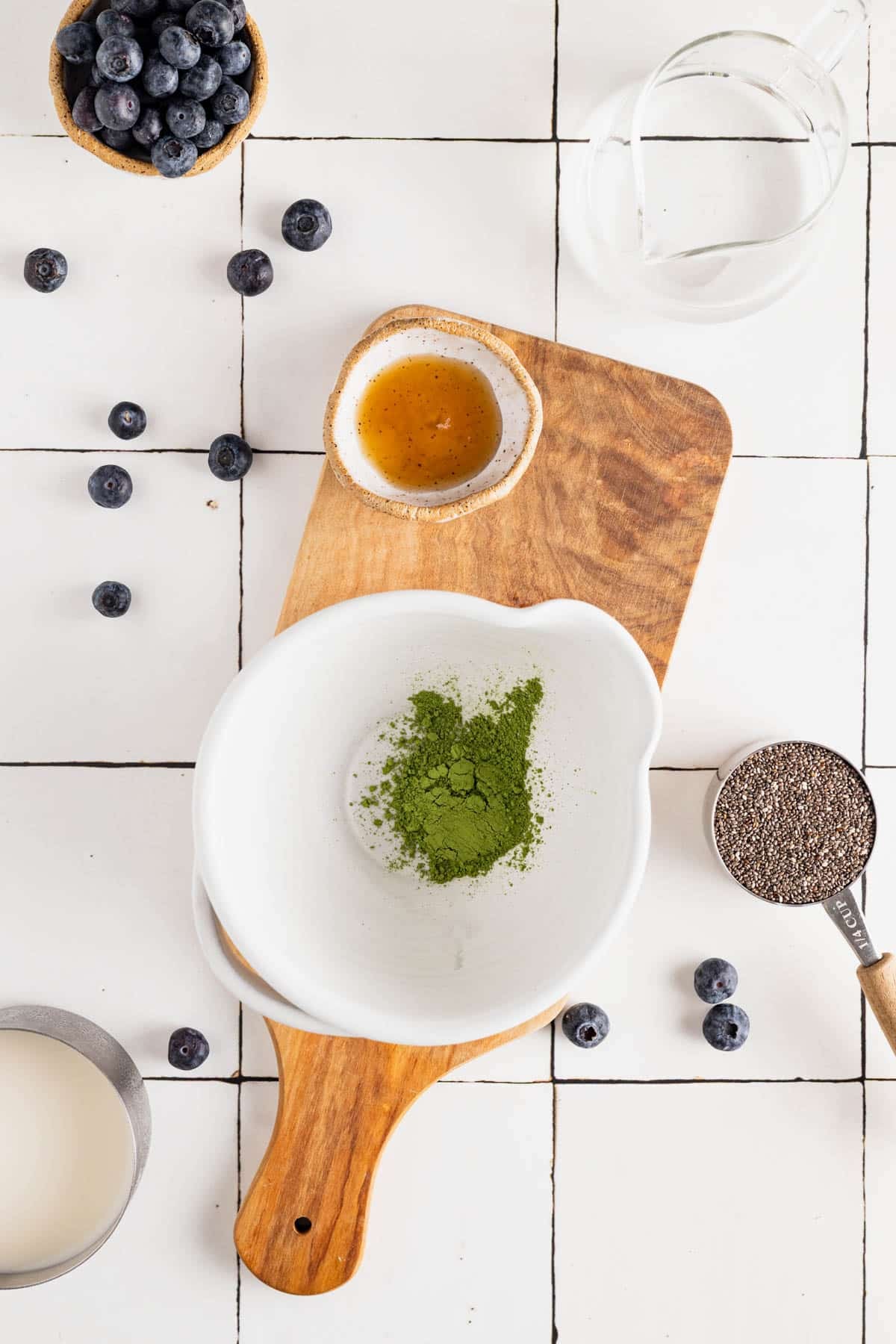 Ceremonial grade matcha in a white bowl.