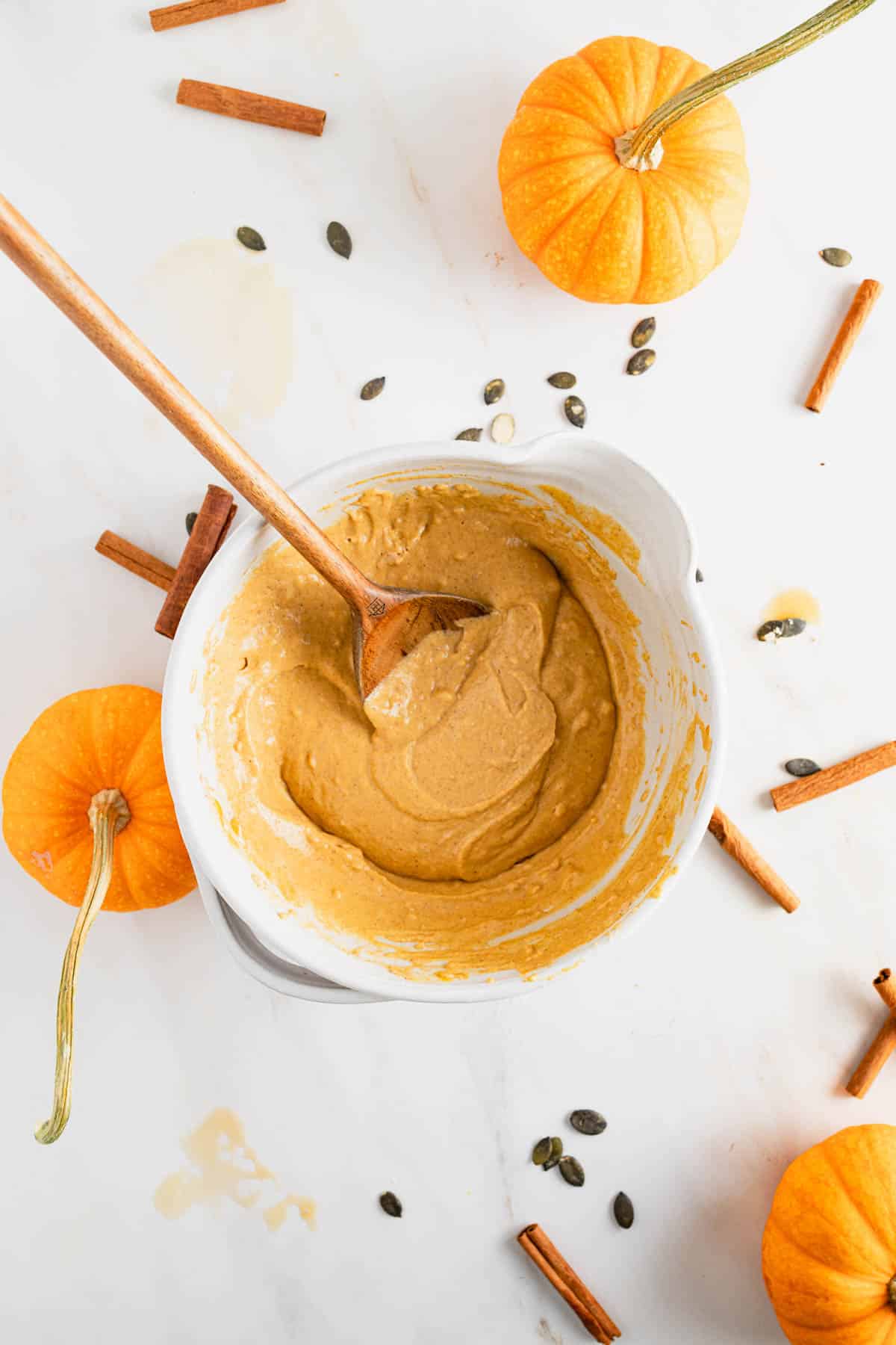 Wet ingredients added on top of dry ingredients and stirred together.