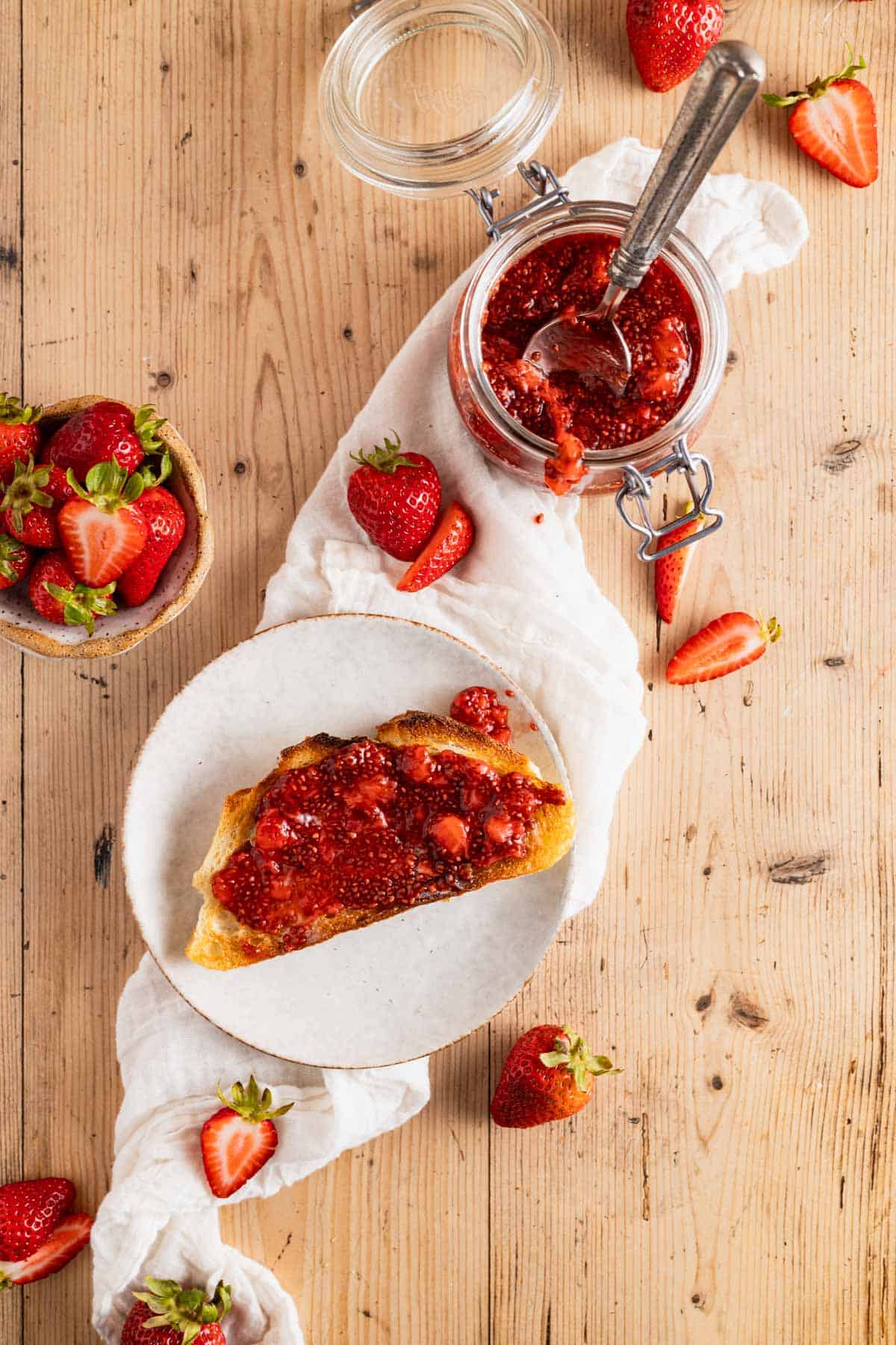 Chia seed berry jam on a piece of toast.