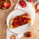 Chia seed berry jam on a piece of toast.