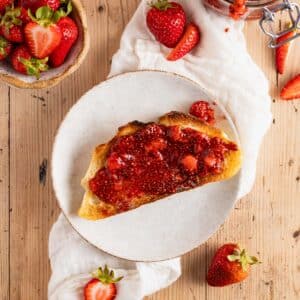 Chia seed berry jam on a piece of toast.