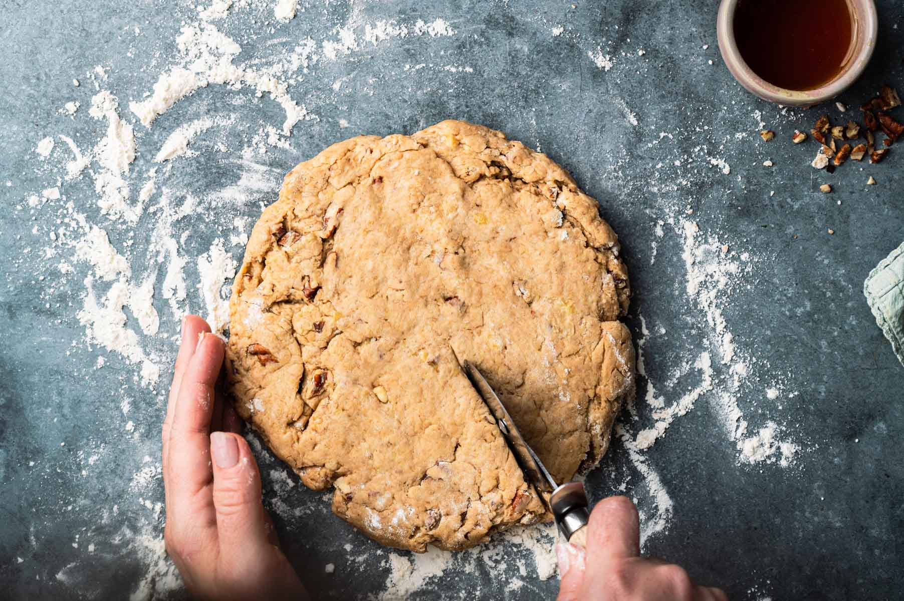 Cutting banana nut scones.