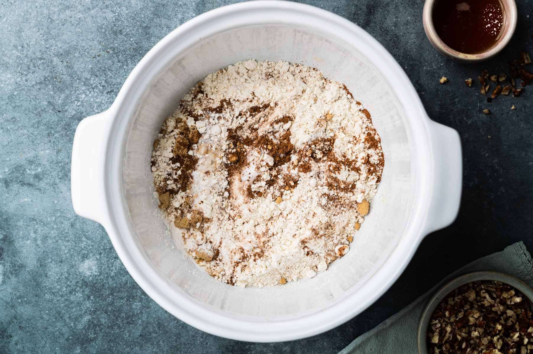 Dry ingredients for healthy banana scones in a large mixing bowl.