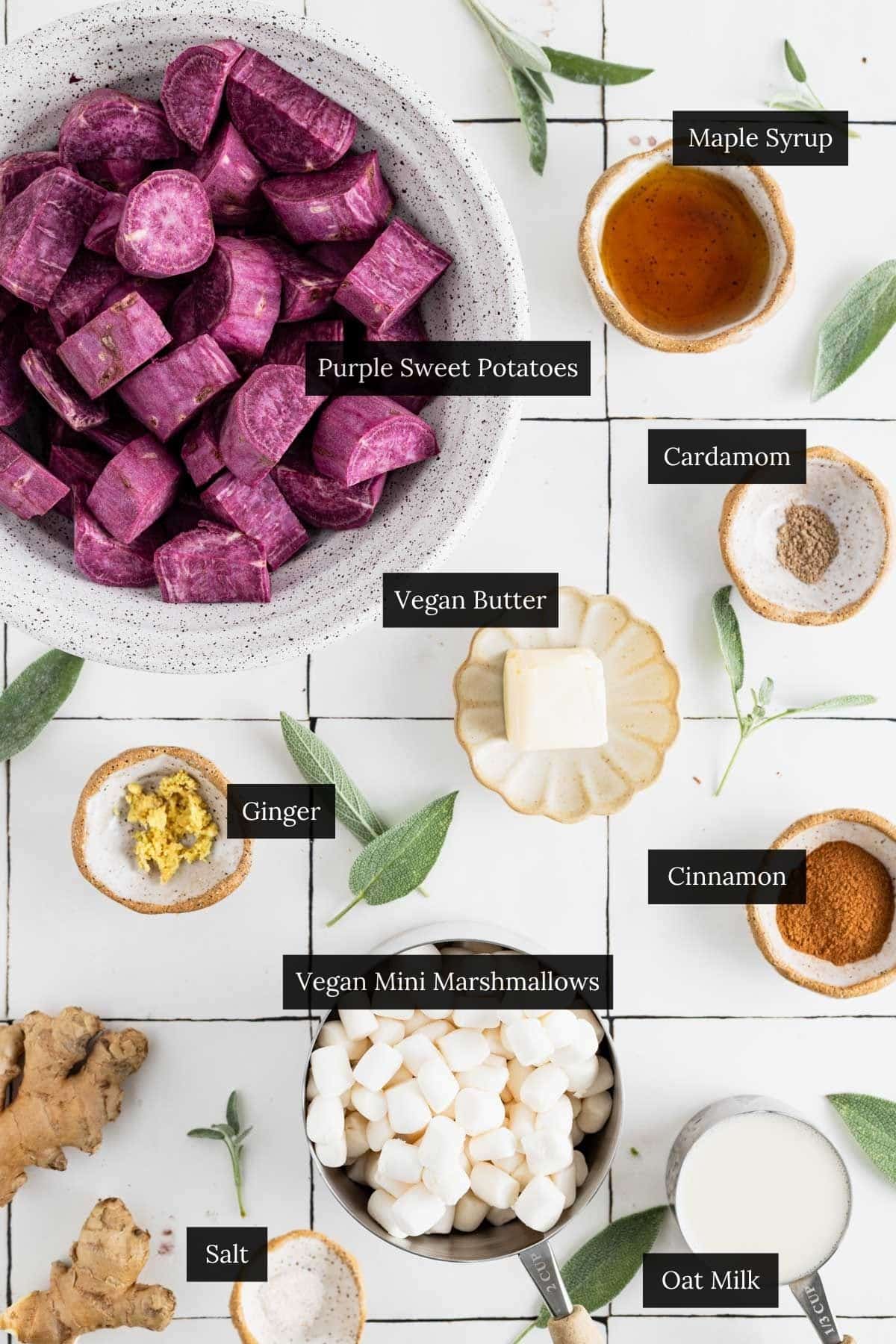 Ingredients for a purple sweet potato casserole on a white tiled table with each ingredient labeled.