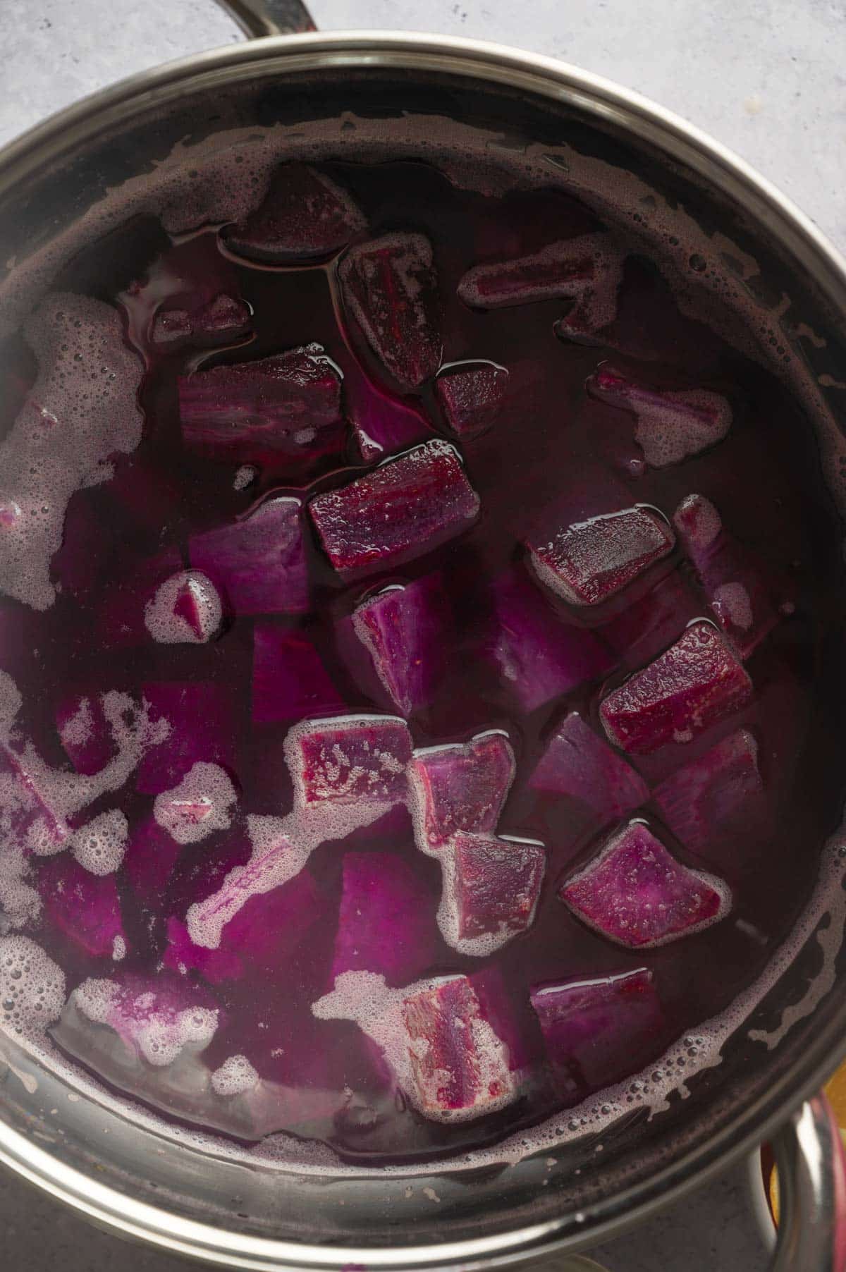 Boiling sweet potatoes for sweet potato pie.