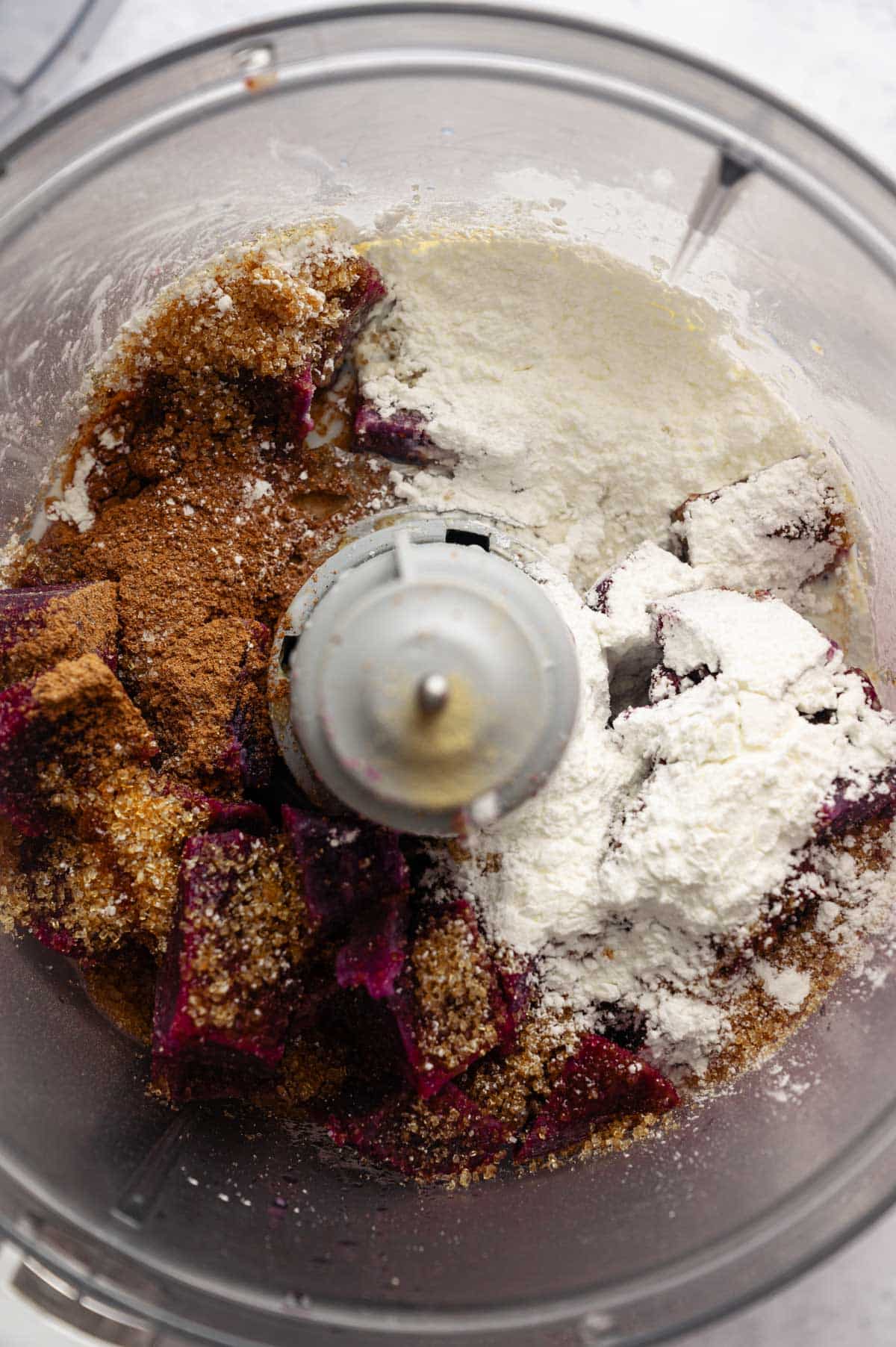 Adding all the ingredients into a food processor.