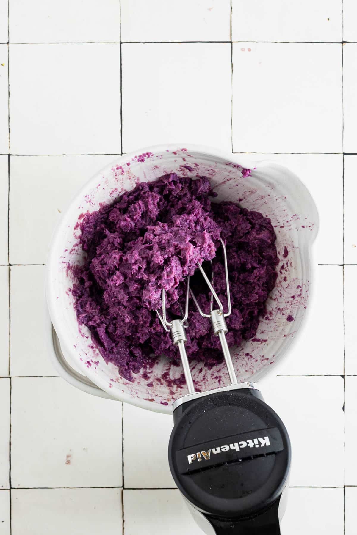 Whipping sweet potatoes with a hand mixer