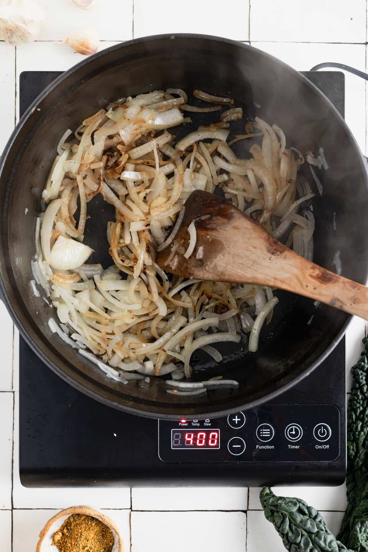Slowly caramelizing onions over medium-low heat.